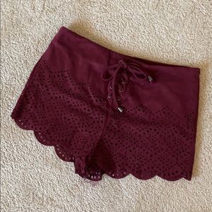 Scalloped hem faux suede shorts